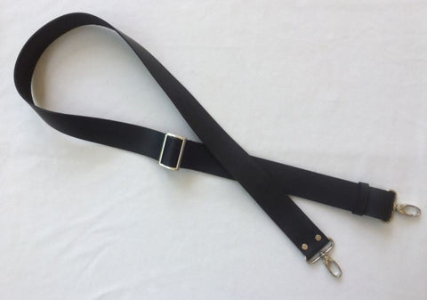 An fully adjustable black crossbody leather purse or bag strap with a satin finish, smooth hand glazed edges, and choice of hardware finishes