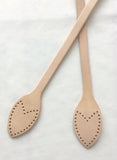 A collection of leather replacement straps for Neverful in beige, brown, black, and dark brown colors