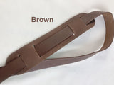 Brown cross body strap with shoulder pad