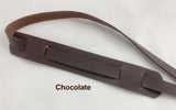 dark brown cross body strap with shoulder pad'